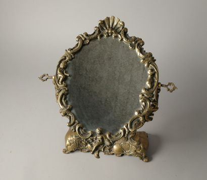 Psyché or table mirror in bronze with cherubs,...