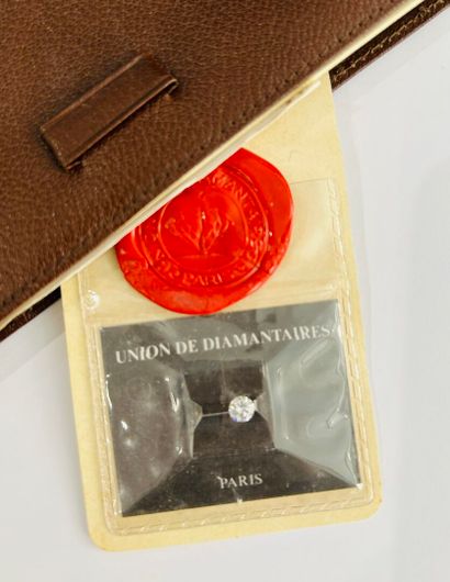 An investment diamond on paper, under seal,...
