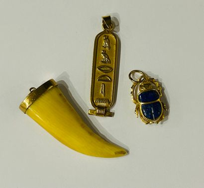 18 k gold lot comprising
A mounted tooth,...
