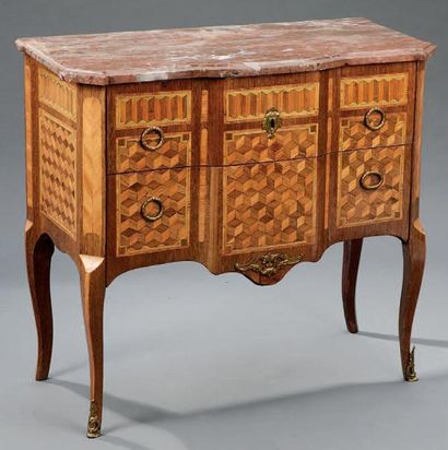 Commode en placage d'amarante orné d'une...
