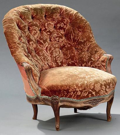 Bergère à dossier enveloppant et assise ronde...