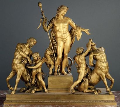 Groupe en bronze ciselé et doré à décor de...