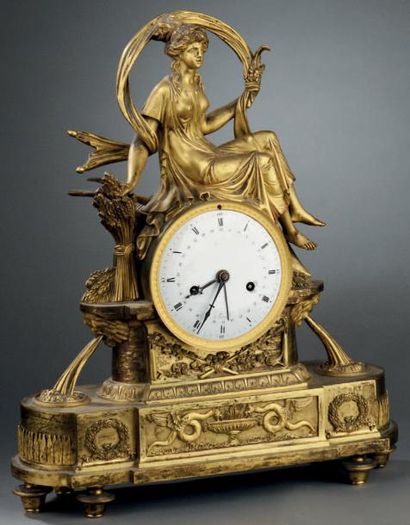 Pendule en bronze ciselé et doré, le cadran...
