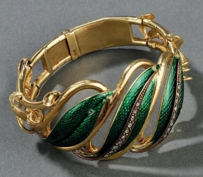 Bracelet semi-rigide ouvrant en or jaune,...