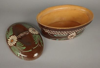 Brown glazed terracotta baeckeoffe dish decorated...