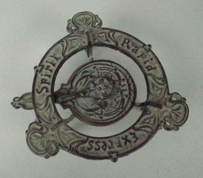 Small cast-iron Art Nouveau-style three-legged...