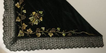 SAVOIE. Triangular shawl made of black silk...