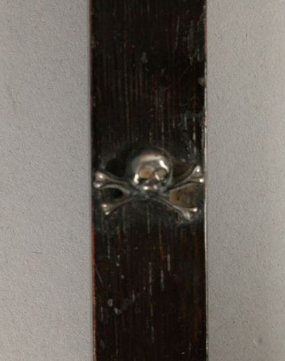 Silver Christ on the cross, surmounted by...