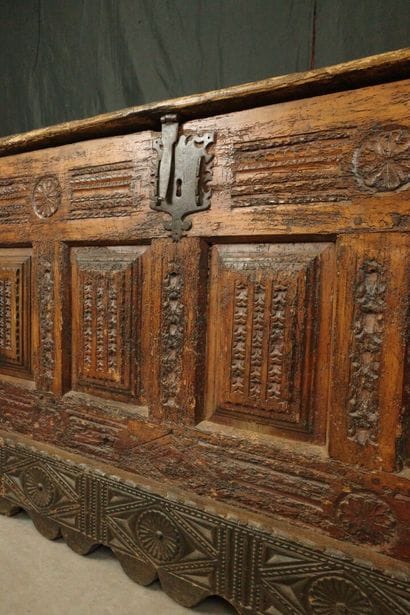 Large natural wood chest with a paneled front...