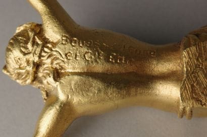 Gilded chiseled bronze Christ 
Signed 