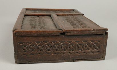 Set includes: - A carved wooden box with...