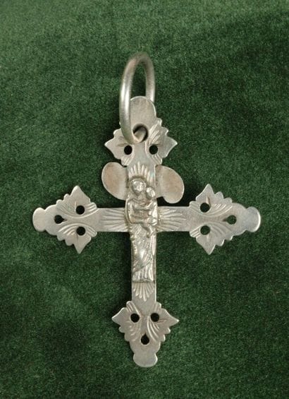 Large silver lattice cross depicting Christ...