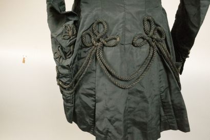 Overcoat, circa 1880. Made of black silk,...