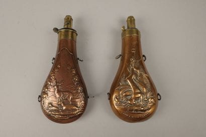 Set of two copper powder flasks: one with...