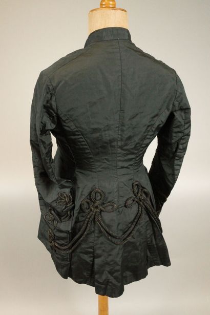 Overcoat, circa 1880. Made of black silk,...