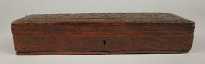 Set includes: - A carved wooden box with...