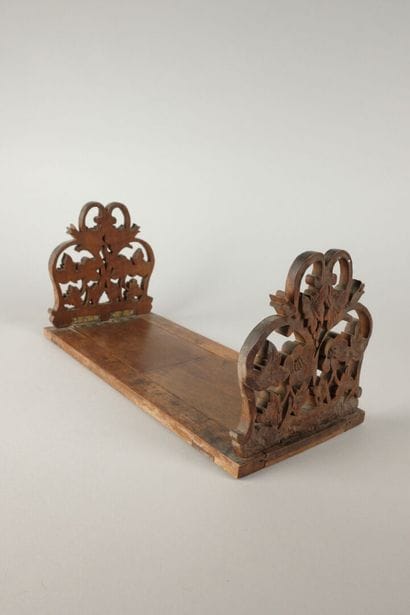 Carved, openwork wooden bookend.
15.5 x 35.5...