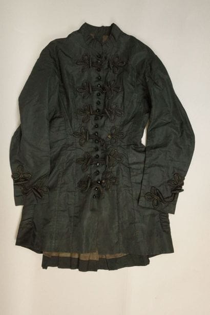 Overcoat, circa 1880. Made of black silk,...