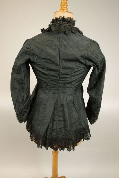 Bodice from around 1880. Made of black silk...