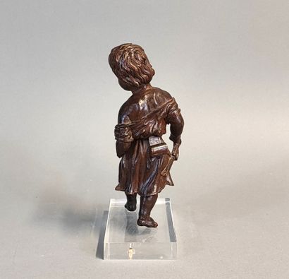 Putto with bugle. Wooden statuette carved...