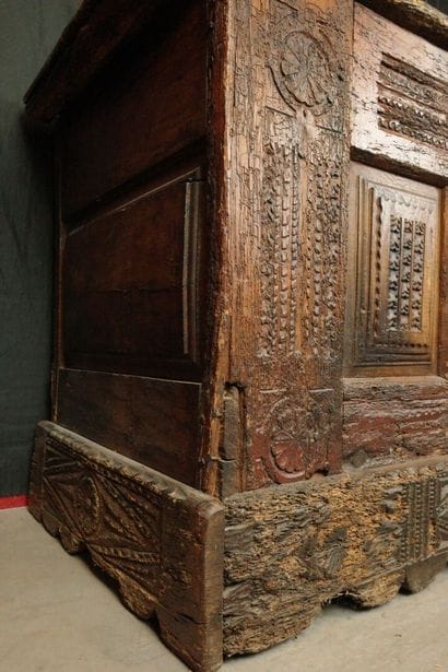 Large natural wood chest with a paneled front...