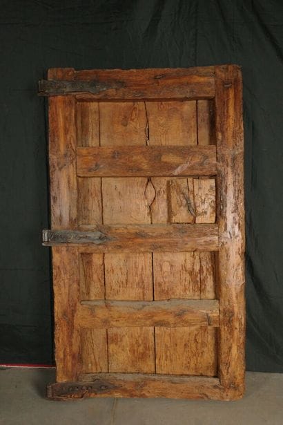 Antique pine barn door with large wrought-iron...