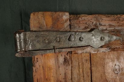 Antique pine barn door with large wrought-iron...
