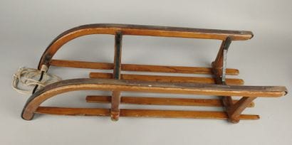 Vintage wooden sled with metal runners
95...
