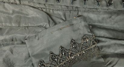 Bodice from around 1880. Made of black silk...