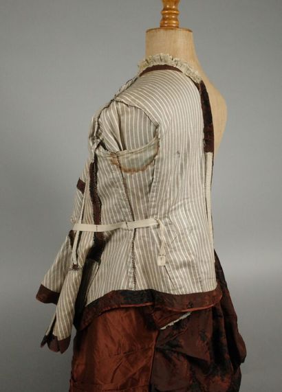 BRESSE. A so-called “tournure” dress made...