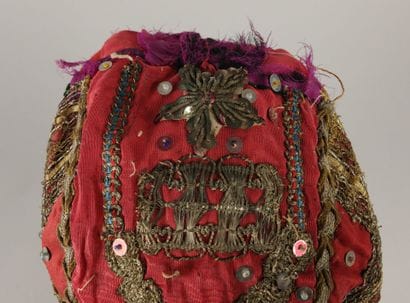 ARVES VALLEY. Red silk headdress lining with...