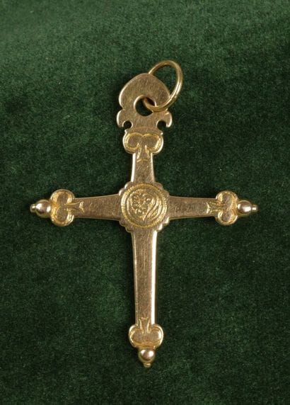 A large Jeannette cross in 750 yellow gold,...