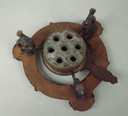 Small cast-iron Art Nouveau-style three-legged...