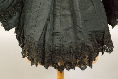 Bodice from around 1880. Made of black silk...