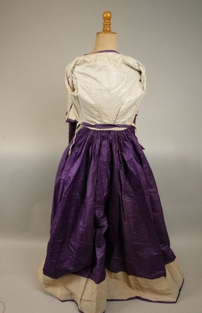 Day dress in purple silk moiré, circa 1860–1870....