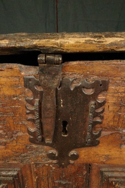 Large natural wood chest with a paneled front...