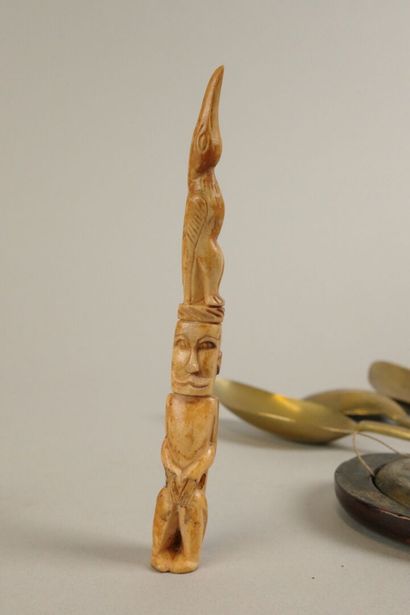 Set of spoons consisting of two wooden spoons—one...