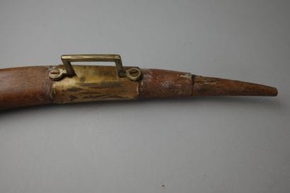 Wooden, brass, and leather donkey yoke with...
