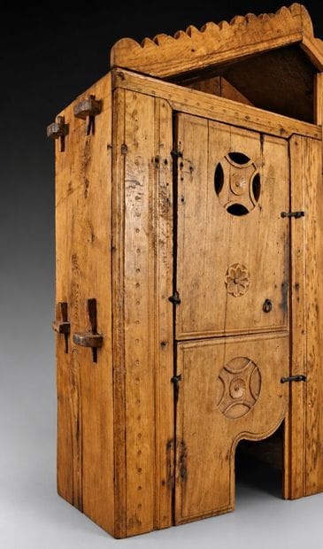 Small sideboard with a crenellated pediment...