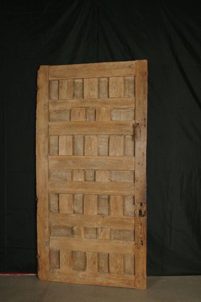 Antique paneled door carved with diamond-shaped...