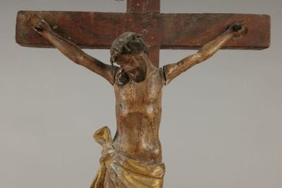Crucifix: a polychrome carved wooden figure...