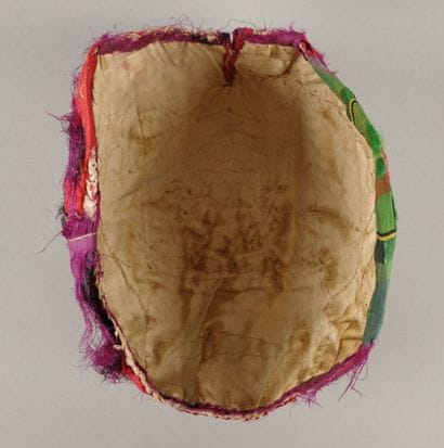 ARVES VALLEY. Red silk headdress lining with...