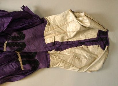 Day dress in purple silk moiré, circa 1860–1870....