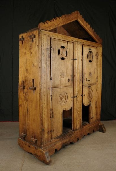 Small sideboard with a crenellated pediment...