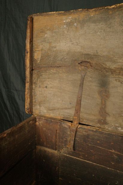 Large natural wood chest with a paneled front...