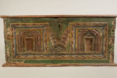 Carved wooden chest with a polychrome front...