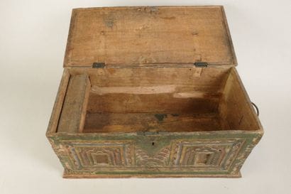 Carved wooden chest with a polychrome front...