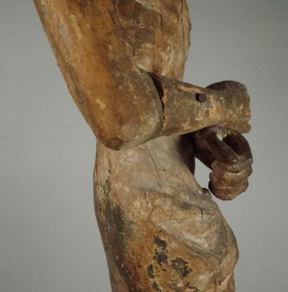 Carved wooden Christ in bonds with traces...