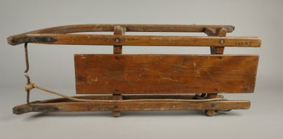 Antique wooden sled with metal runners
84...
