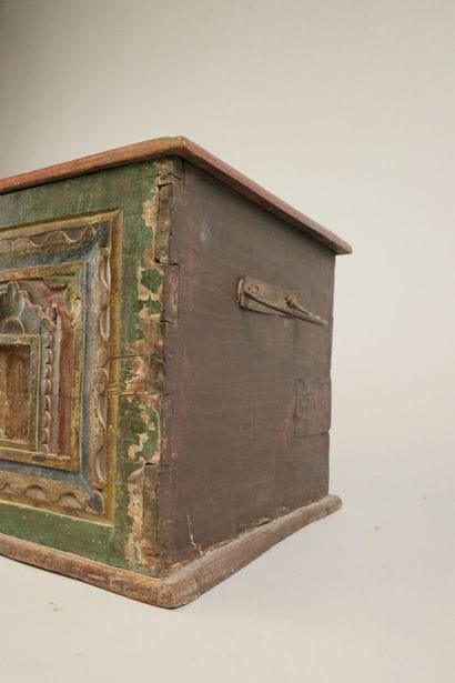Carved wooden chest with a polychrome front...